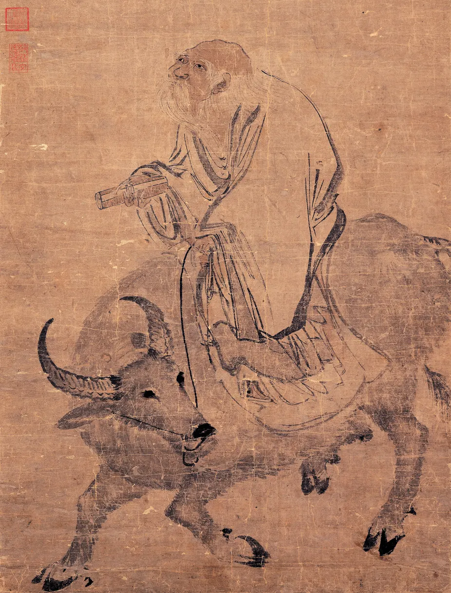 Ming-dynasty ink painting of Laozi, an old man with a long beard, seated on the back of an ox.