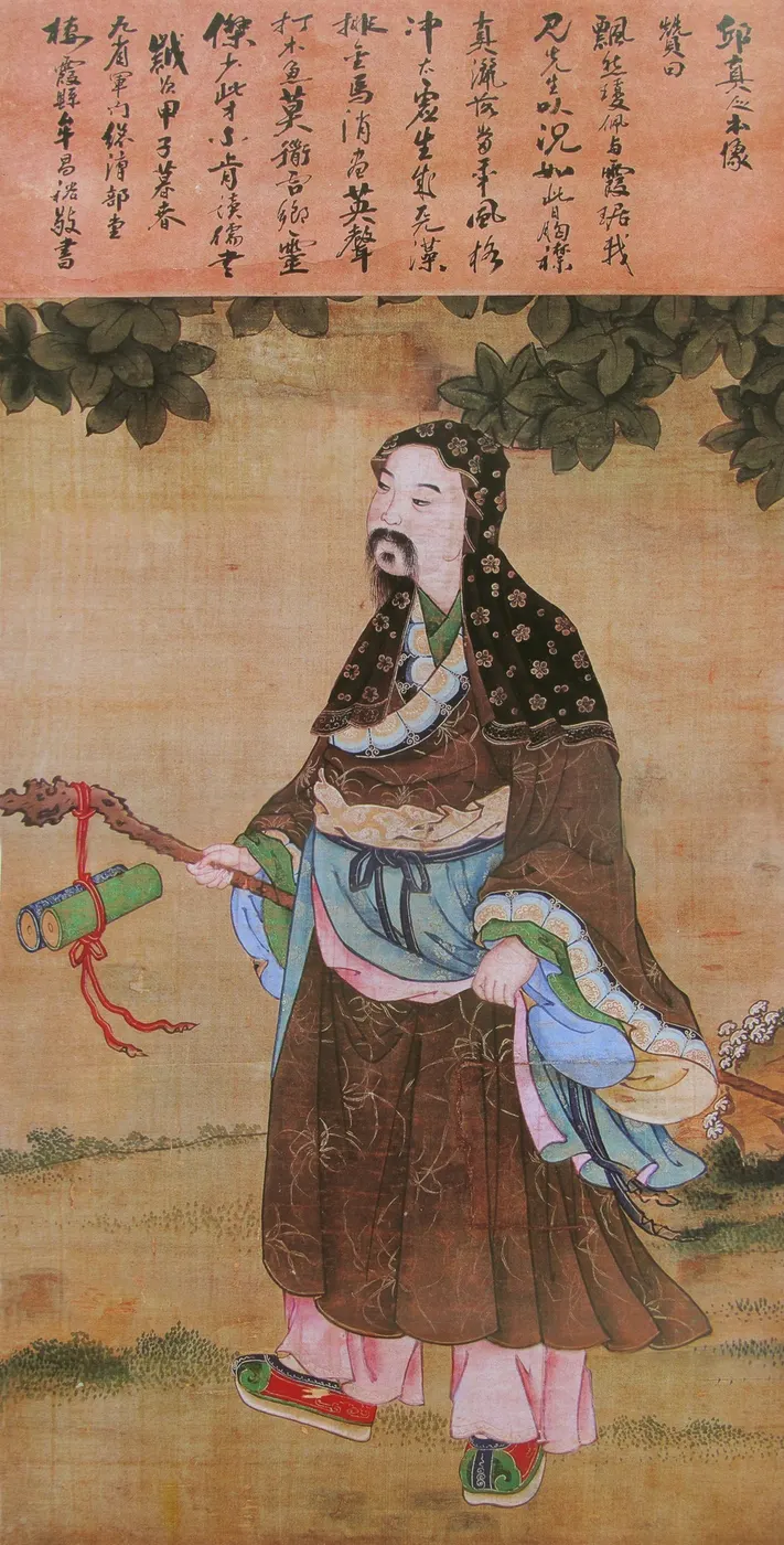 Painted portrait of Qiu Chuji in Taoist robes, seated and holding a fan.